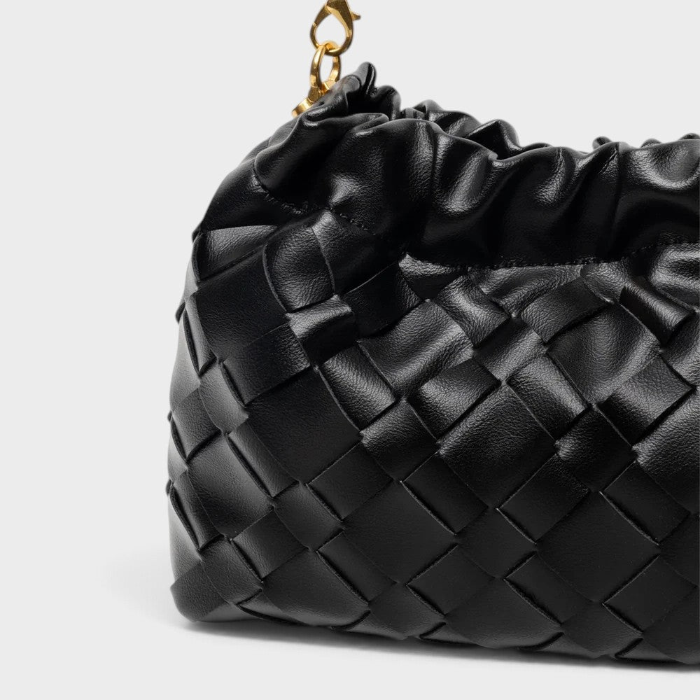 VALENORA black woven leather shoulder bag with a gathered top and gold-tone chain strap detail.