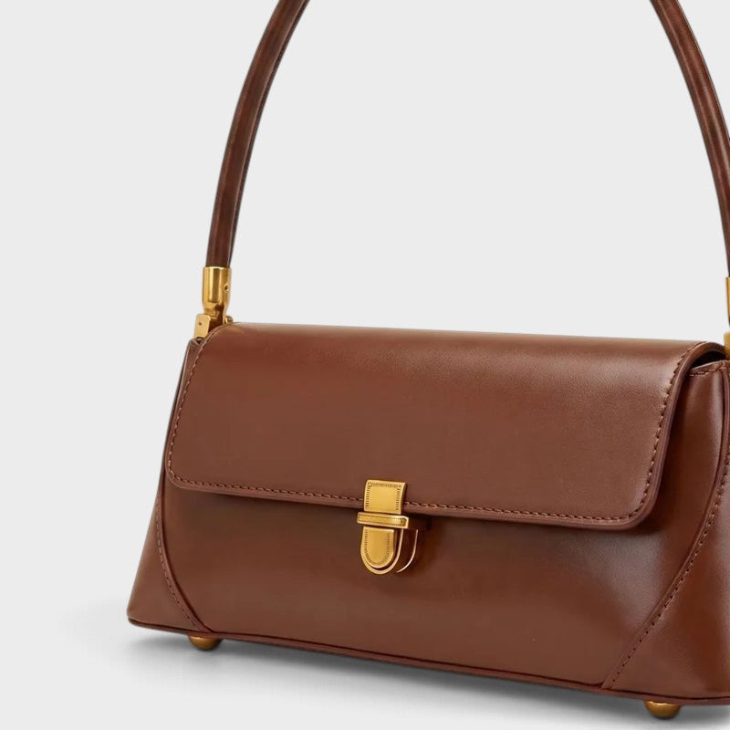 VALENORA Amancia brown synthetic leather baguette shoulder bag with gold-toned clasp hardware and structured base