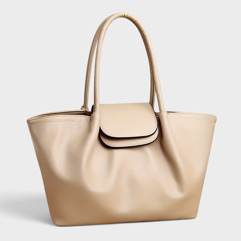 VALENORA Amara beige vegan leather tote bag with structured boxy silhouette, dual shoulder straps, and buckle flap.