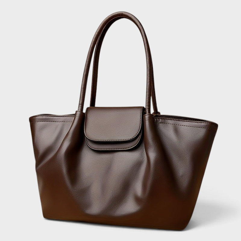 VALENORA Amara structured dark brown vegan leather tote bag with dual shoulder straps and front flap buckle closure.