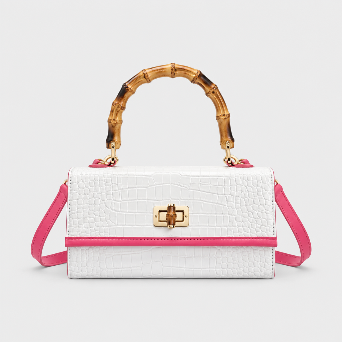 VALENORA Bamboo Luxe white croc-embossed leather handbag with a bamboo handle and pink trim details.