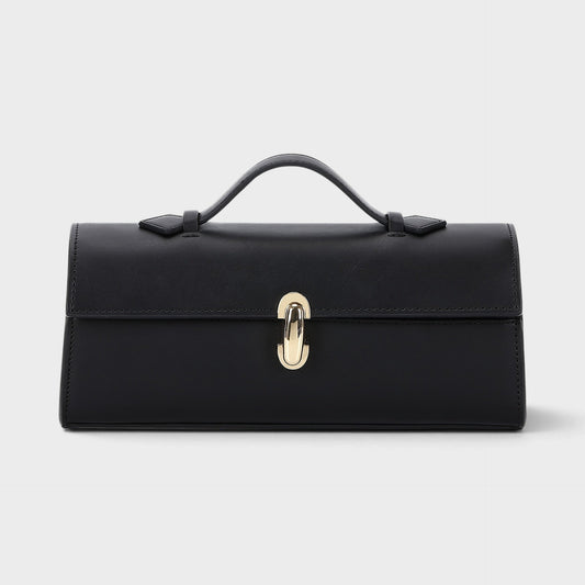 VALENORA Bella black genuine leather handbag with a structured boxy silhouette and a polished gold metal clasp.