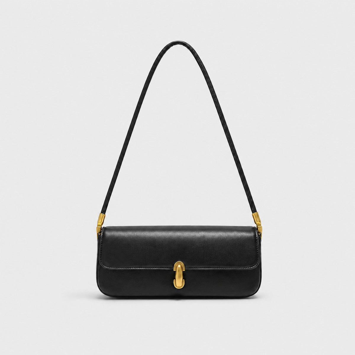 VALENORA Bianca black microfiber leather shoulder bag with a structured flap and gold link-style clasp hardware.