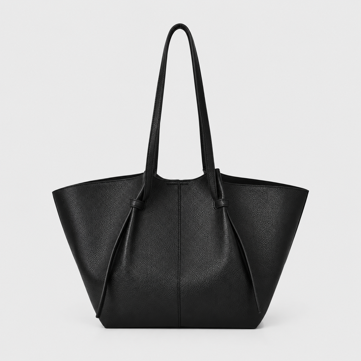 VALENORA black vegan leather Terra tote bag with a slouchy, flared silhouette and tall shoulder straps.