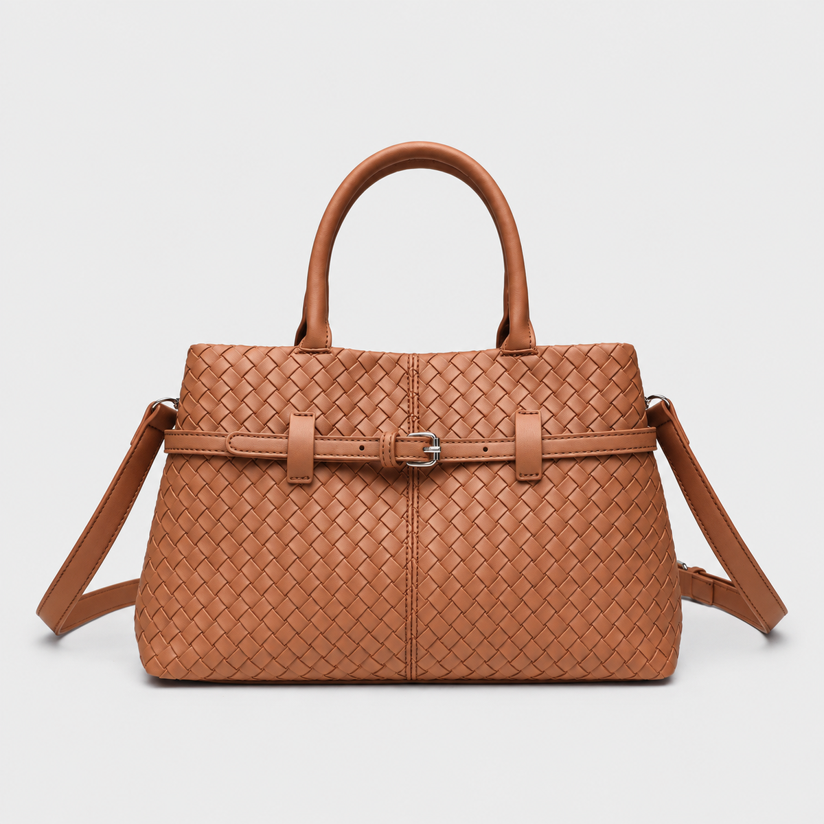 VALENORA brown vegan leather handbag with a woven texture, structured silhouette, and a slim buckled belt strap.