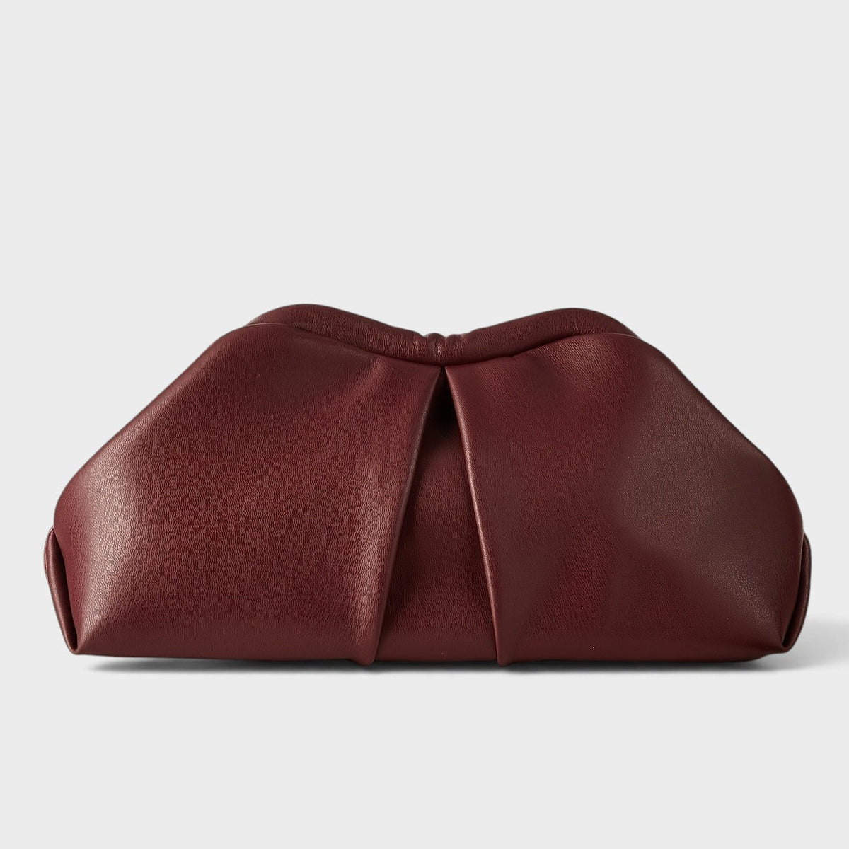 VALENORA Colette burgundy vegan leather clutch bag with a soft pleated pouch design