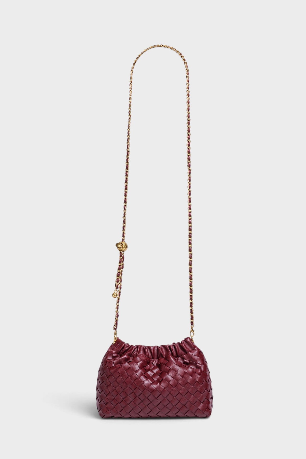 VALENORA Adele red woven PU leather crossbody bag with a gold chain strap and drawstring cloud silhouette