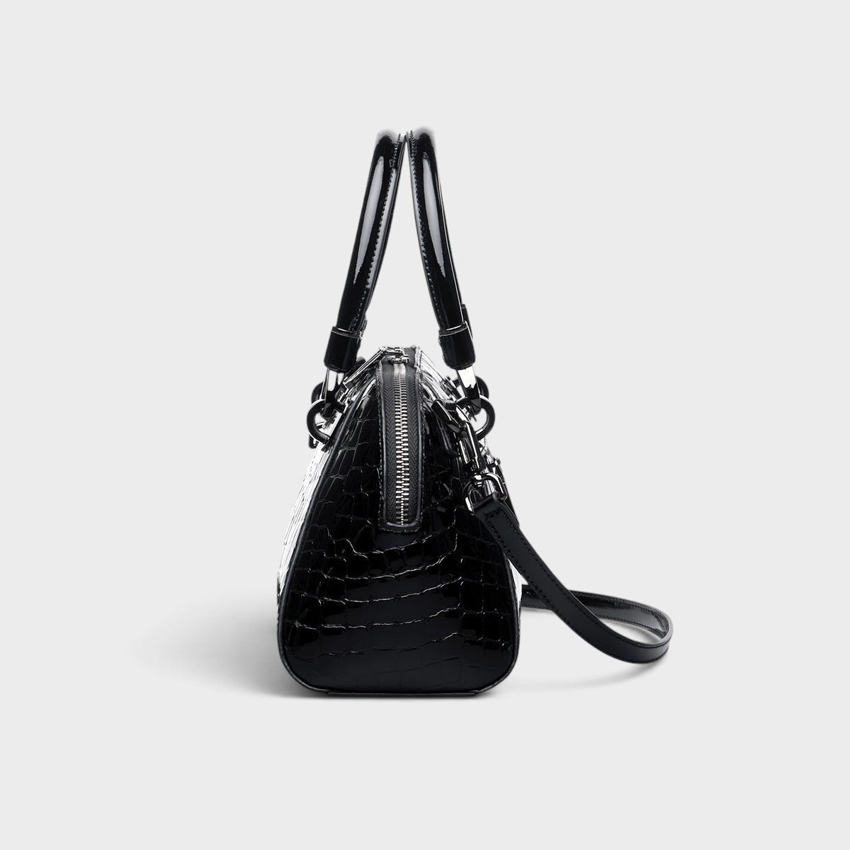 VALENORA Celeste black croc-embossed leather handbag with polished hardware, side view showing structured design.