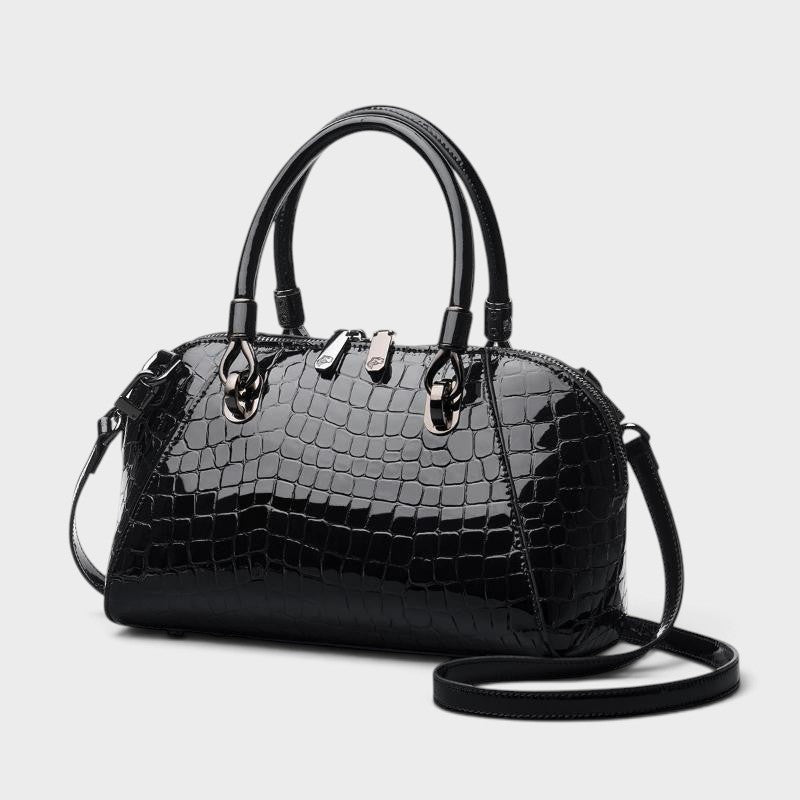 VALENORA Celeste black croc-embossed leather handbag with polished hardware and structured top handle design.
