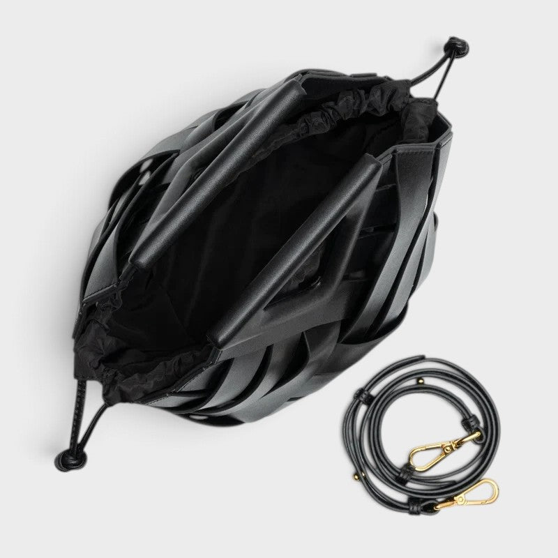 VALENORA Celia black woven leather handbag with a drawstring closure and detachable shoulder strap on white background