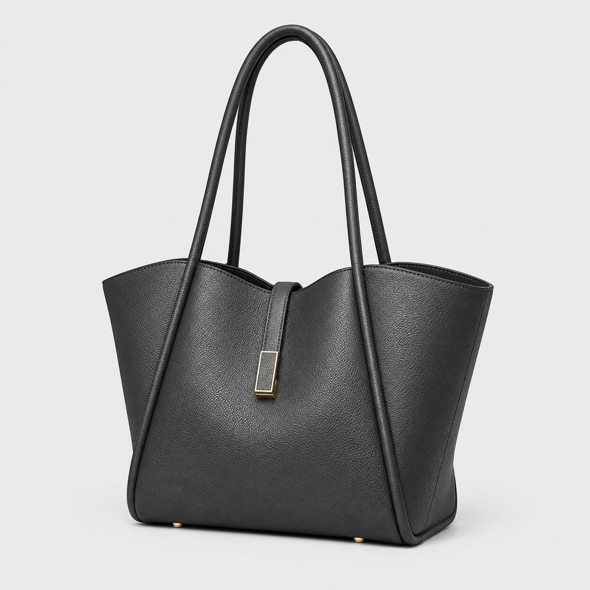VALENORA Charlotte black vegan leather tote bag with litchi-grain texture, curved top edge, and gold hardware tab.
