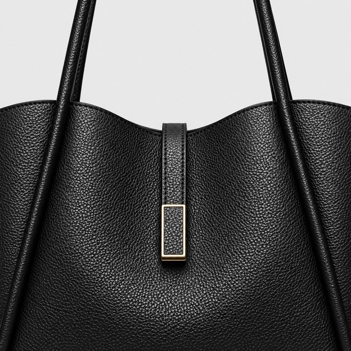 VALENORA Charlotte black vegan leather tote bag with litchi-grain texture and gold rectangular hardware detail