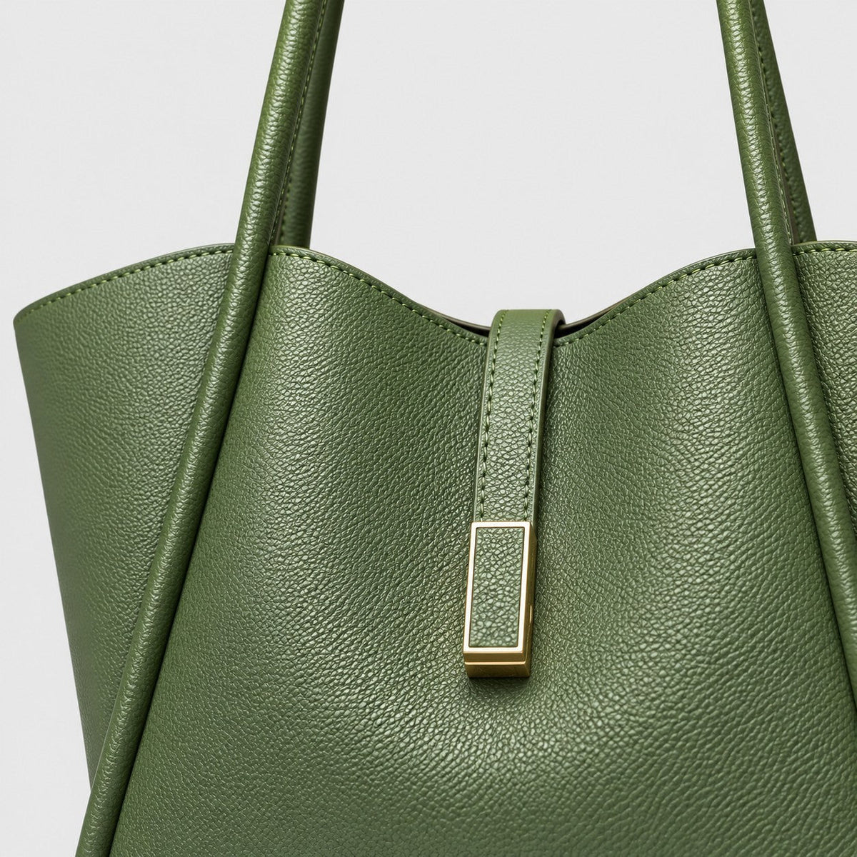 VALENORA Charlotte tote bag in olive green litchi-grain vegan leather with a gold hardware tab detail.