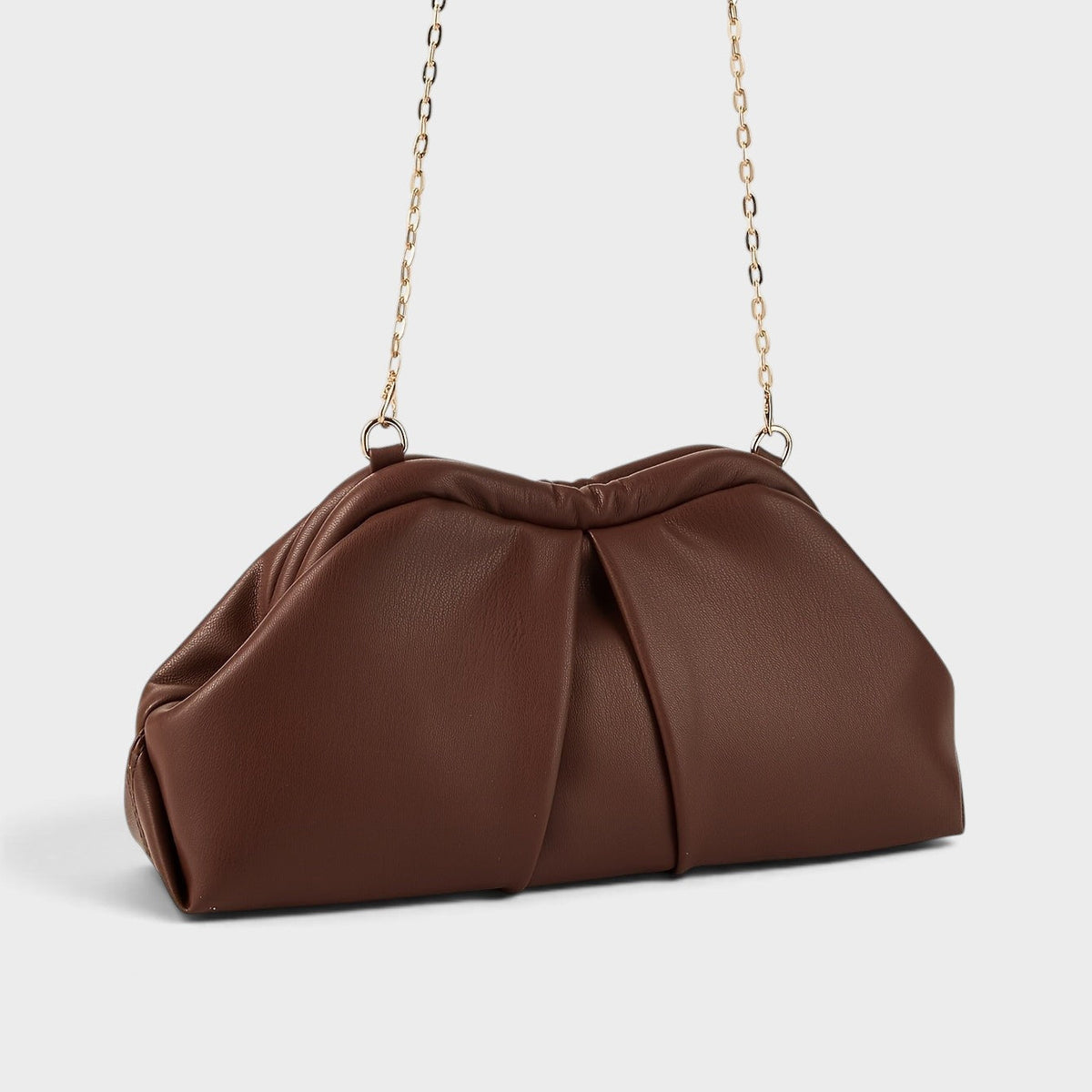 VALENORA Colette clutch bag in dark brown vegan leather with a soft pleated design and detachable gold chain strap.