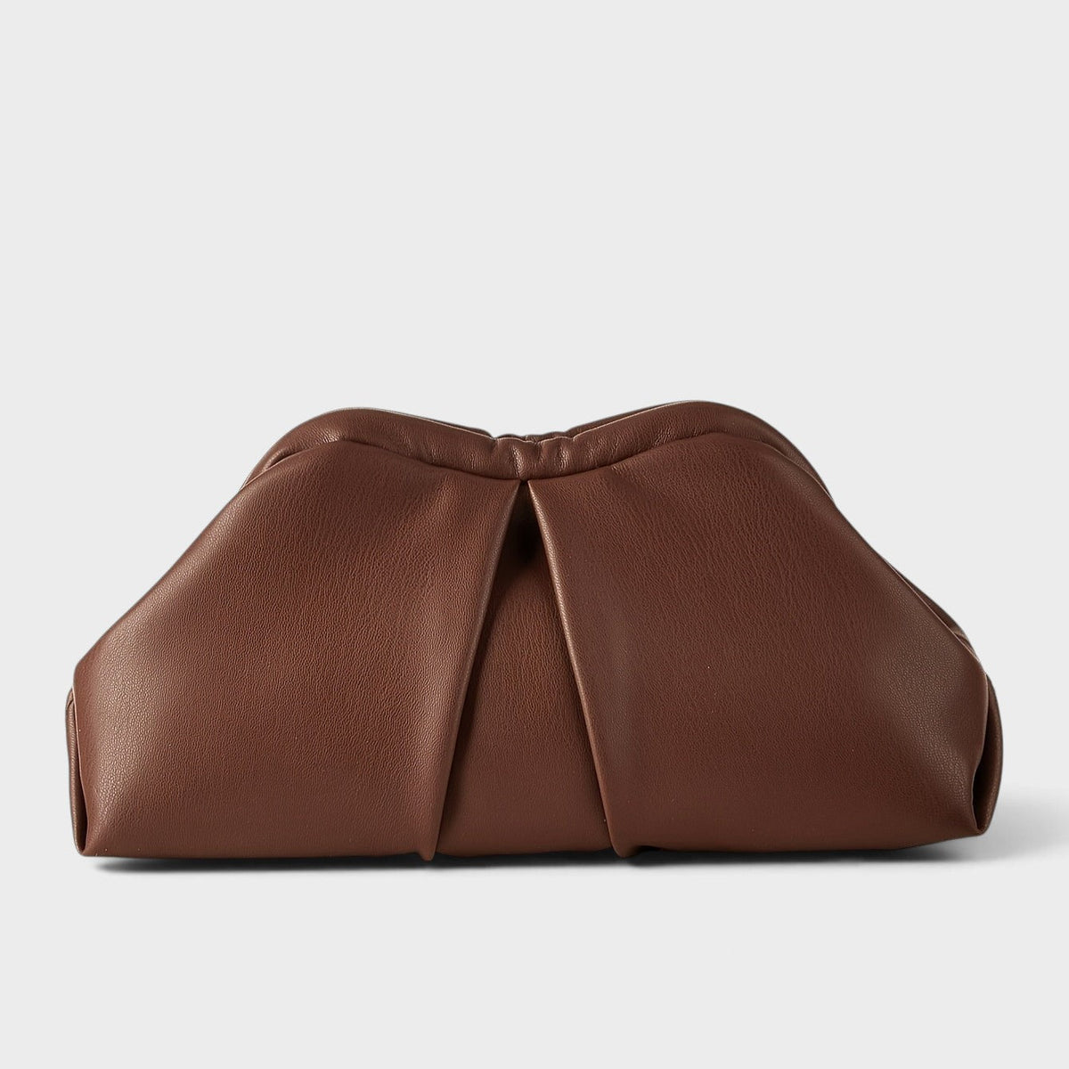 VALENORA Colette clutch bag in rich brown vegan leather with a soft, pleated, cloud-like silhouette.