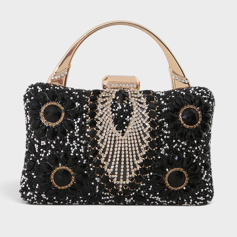 VALENORA Elara black crystal and gemstone embellished formal clutch bag with a gold metal handle
