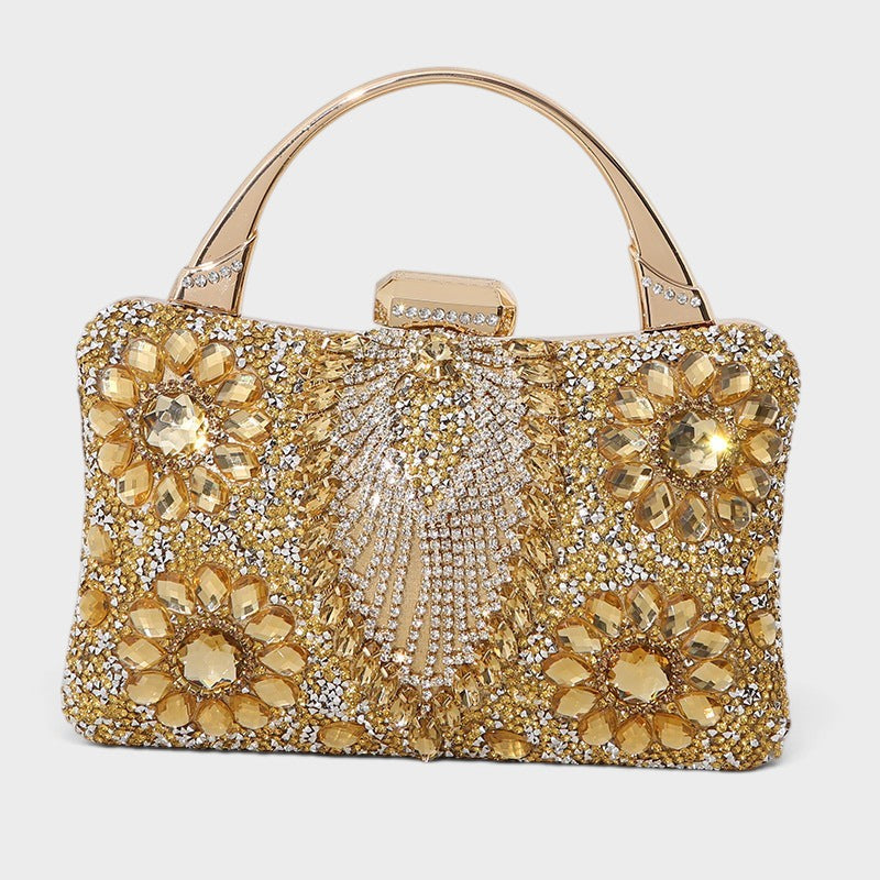 VALENORA Elara gold crystal and gemstone embellished formal clutch bag with a metallic top handle