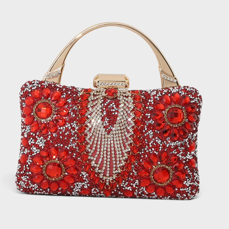 VALENORA Elara red crystal and gemstone embellished formal clutch bag with a gold metal handle