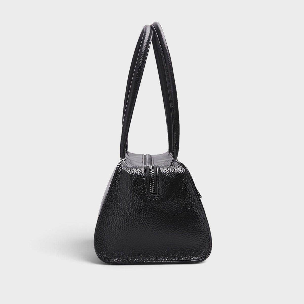 VALENORA Elsbeth black cowhide genuine leather handbag with fixed shoulder straps and zipper closure, side view