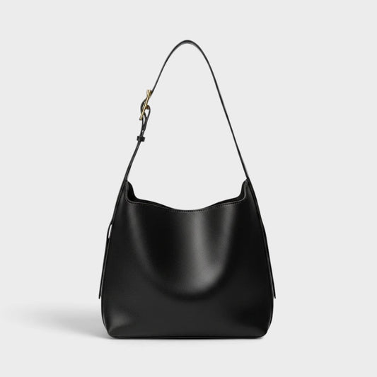 VALENORA Ember black vegan leather tote bag with a minimalist design and adjustable shoulder strap