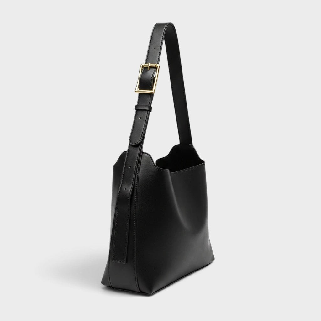 VALENORA Ember black vegan leather tote bag with a minimalist design and adjustable shoulder strap