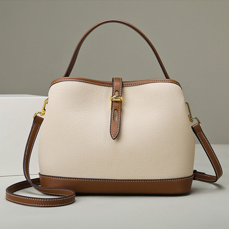 VALENORA Estelle shoulder bag in beige vegan leather with brown trim and gold hardware details.
