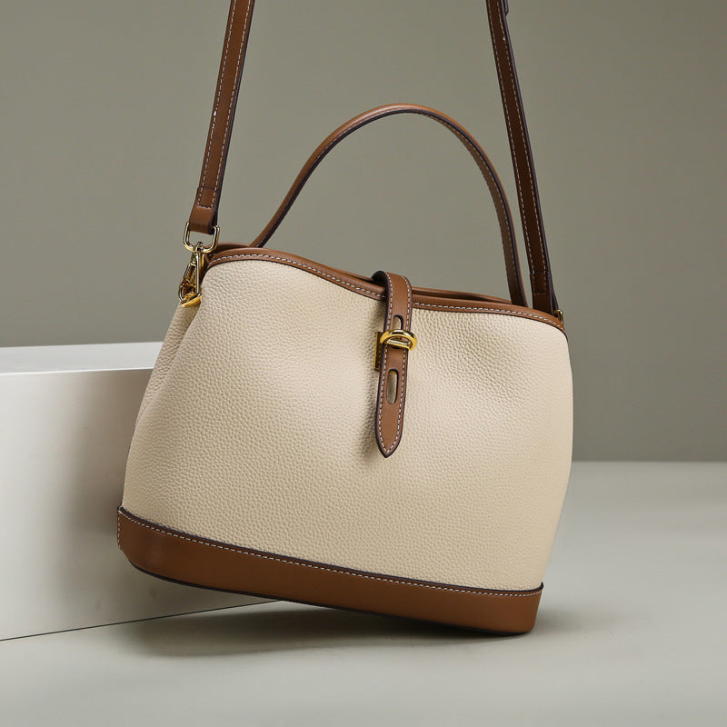 VALENORA Estelle beige vegan leather shoulder bag with brown trim and gold buckle detail