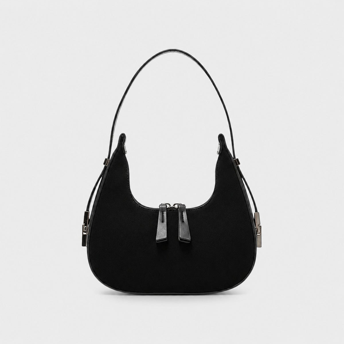VALENORA French black suede and leather shoulder bag with a rounded silhouette and dual zipper closure.
