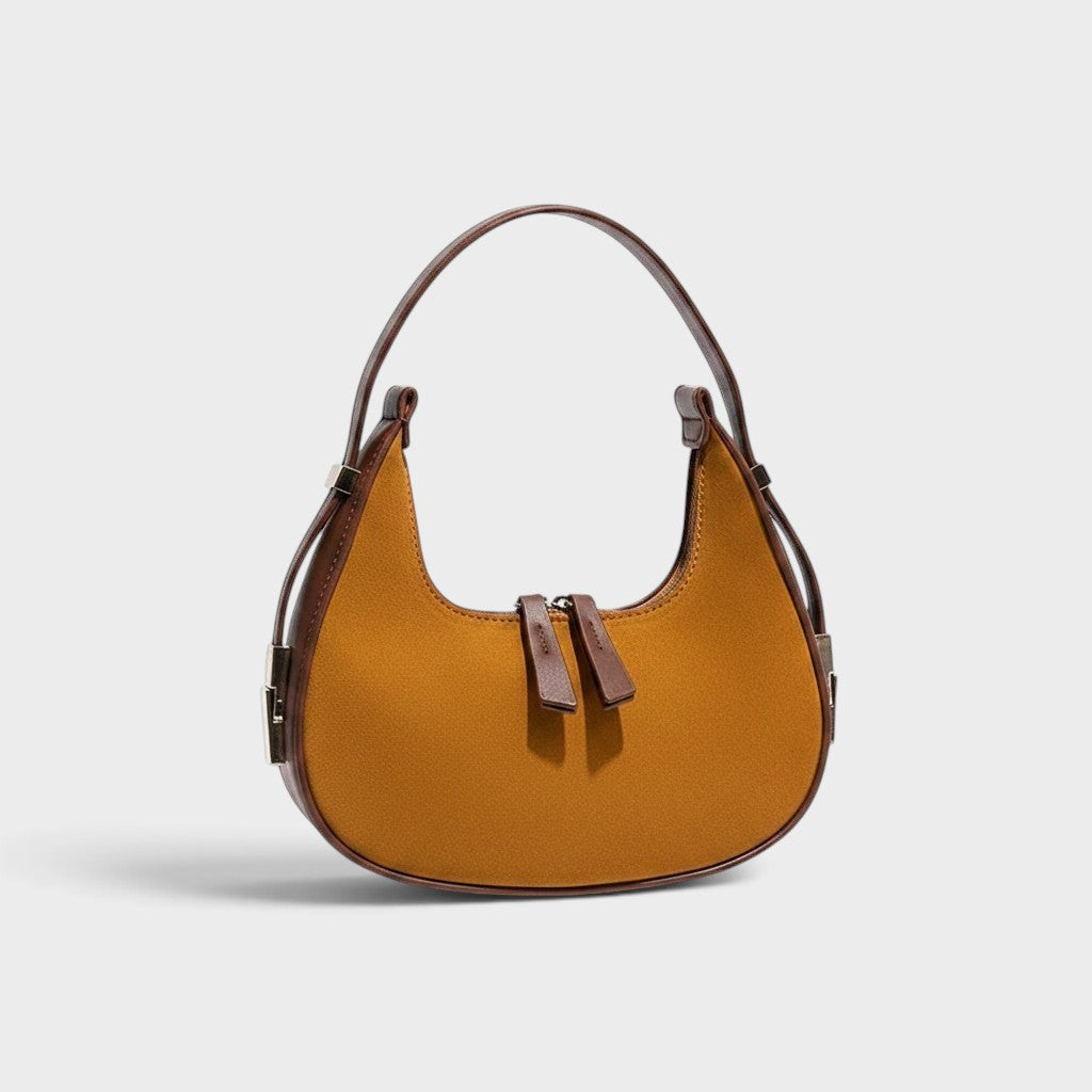 VALENORA French shoulder bag in brown suede and leather with a rounded silhouette and dual zipper pulls.