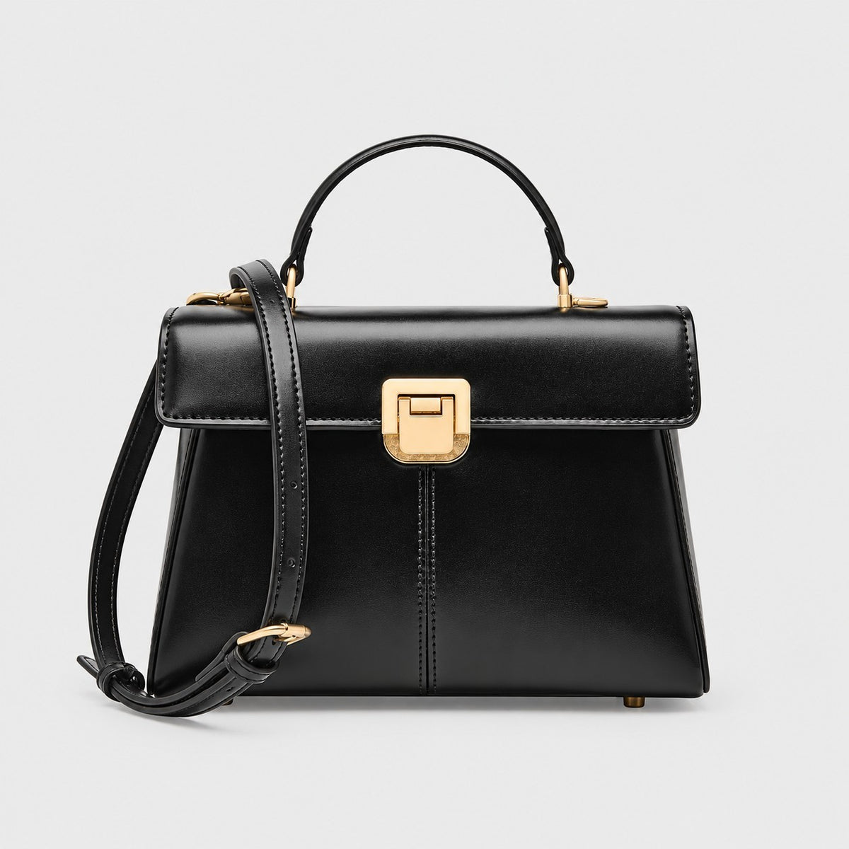 VALENORA Henna black genuine leather crossbody handbag with a structured rectangular silhouette and gold hardware.