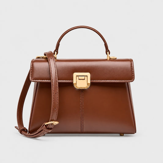 VALENORA Henna dark brown genuine leather crossbody handbag with a structured rectangular shape and gold hardware.