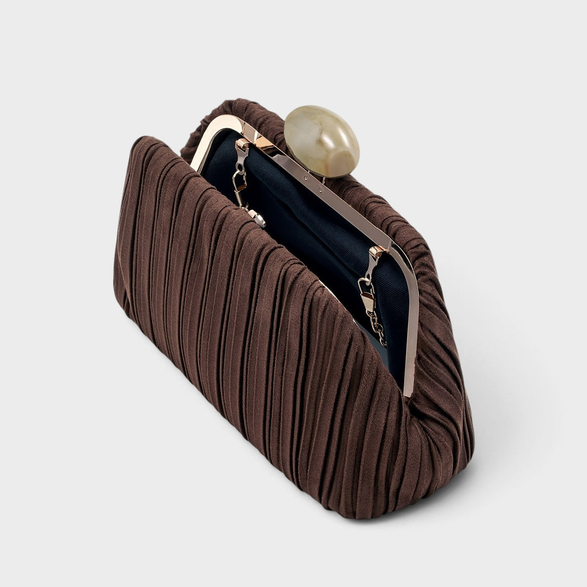 VALENORA Liora brown pleated suede clutch bag with a smooth oval stone clasp and gold frame detail