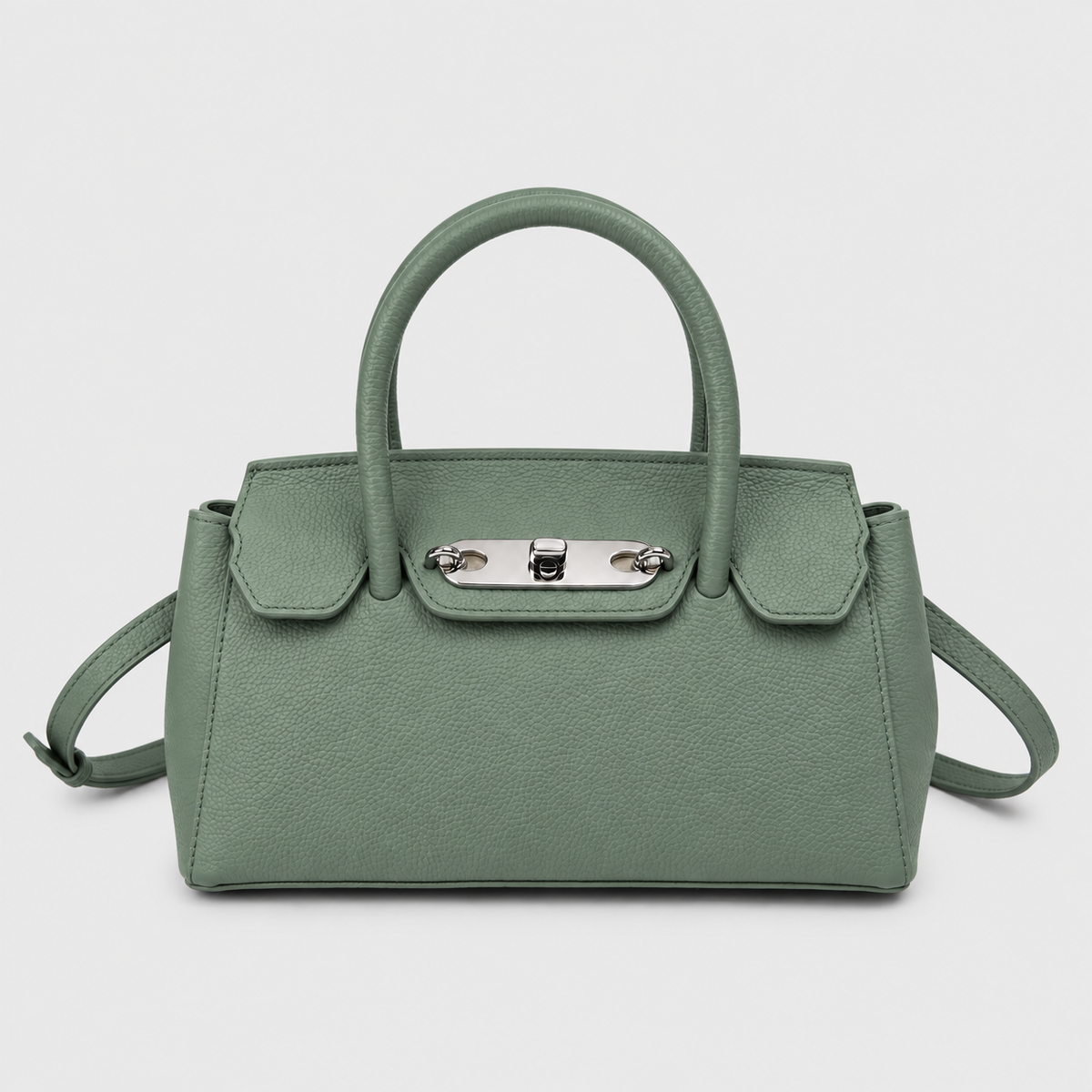VALENORA Lorraine shoulder bag in sage green genuine leather with a structured boxy shape and polished silver buckle.