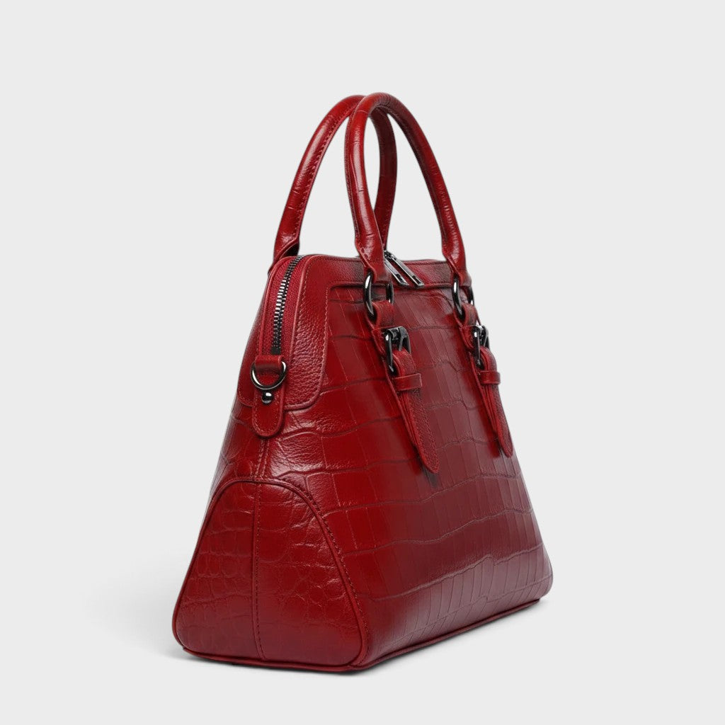 VALENORA Lucienne wine red leather handbag with a structured crocodile-embossed texture and dual top handles.