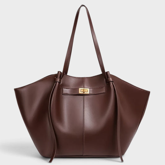 VALENORA Madison leather tote bag in deep burgundy with a sculptural knotted handle and gold-tone hardware.