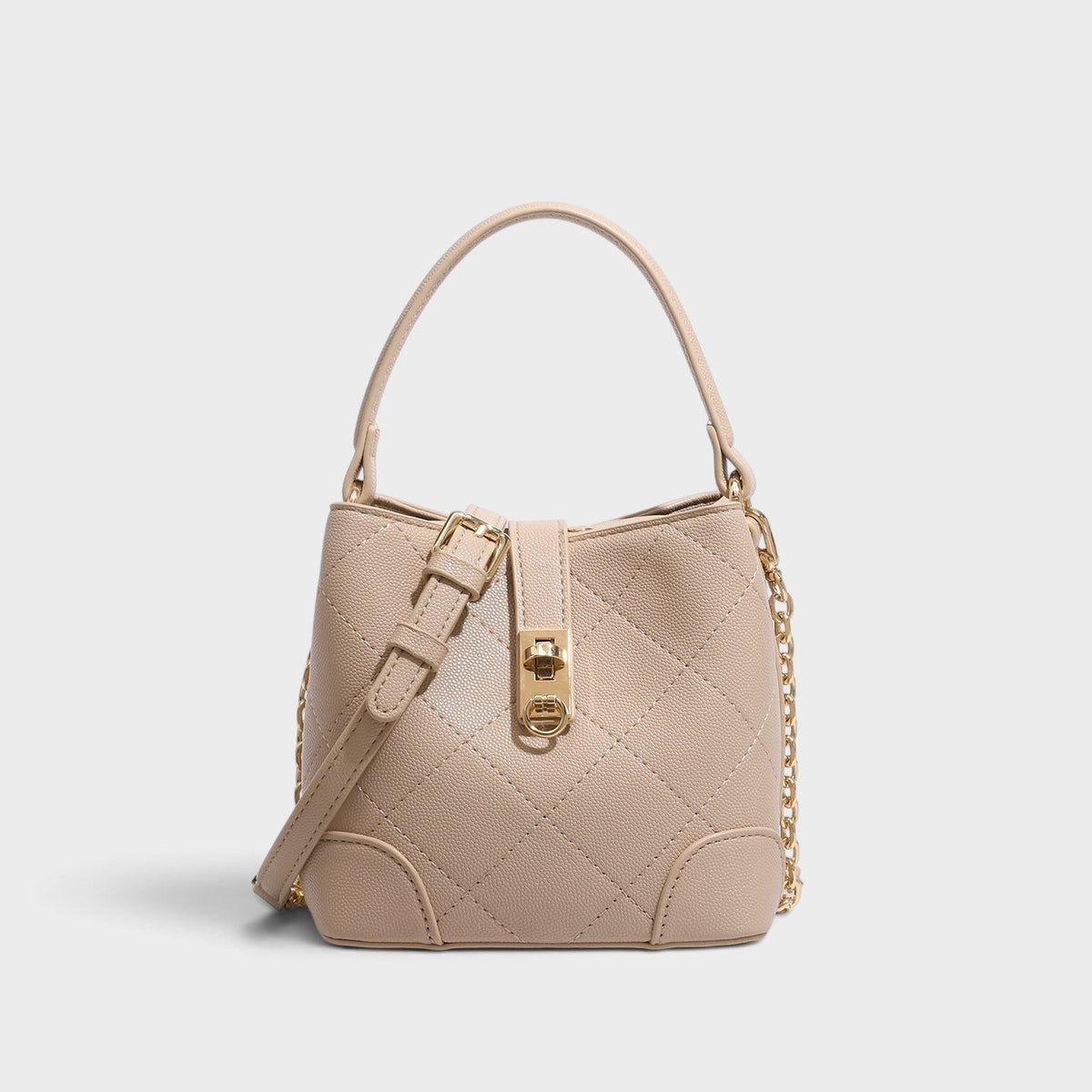 VALENORA Margot beige quilted vegan leather bucket shoulder bag with gold turn-lock closure and side chain detail