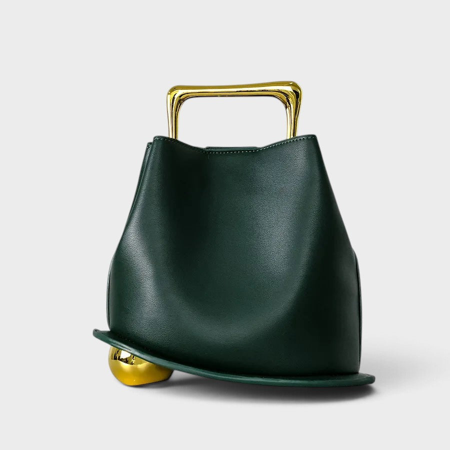 VALENORA Marisol handbag in dark green with a sculptural silhouette, gold-toned metallic handle, and spherical base.