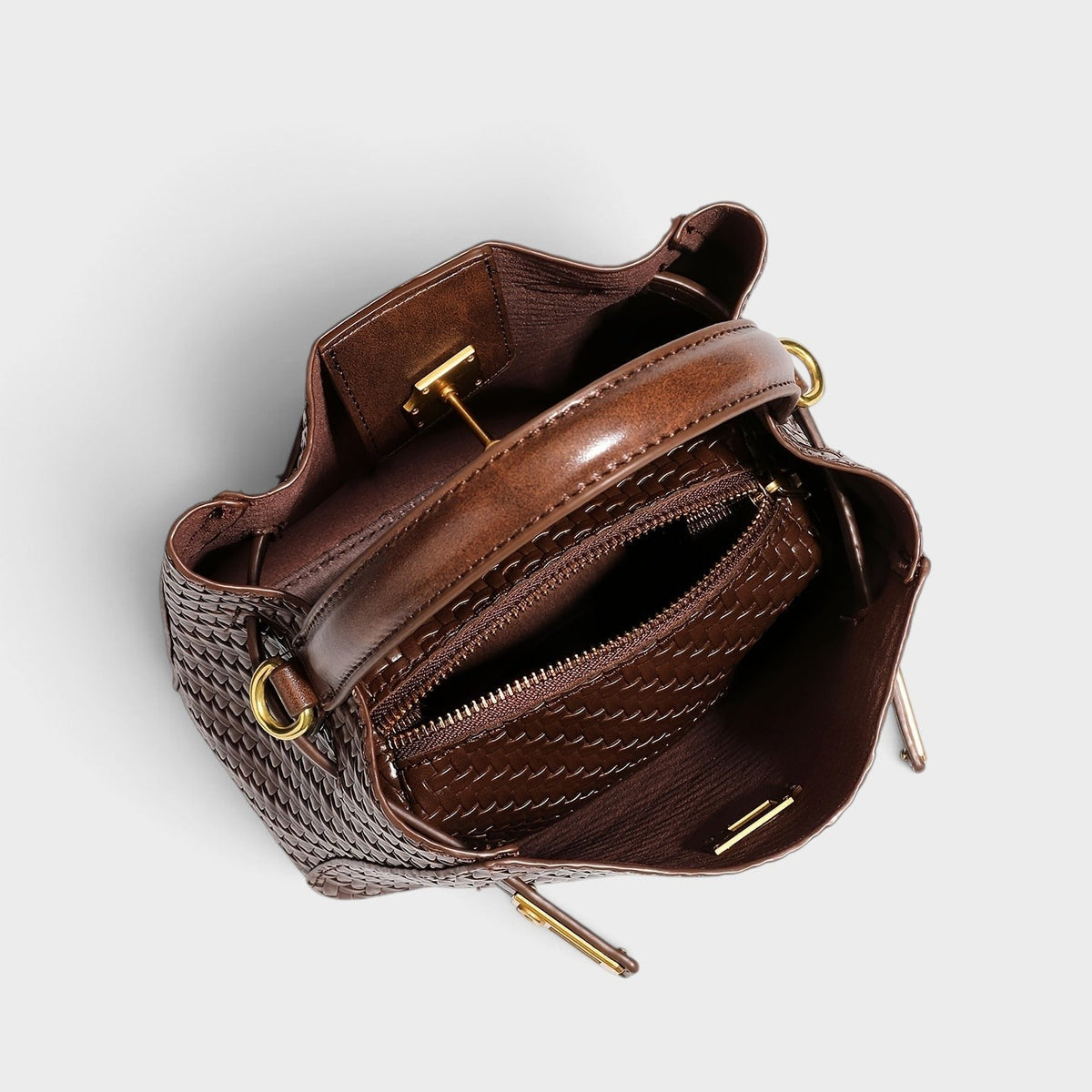 VALENORA Miranda brown woven genuine leather shoulder bag, top-down view showing interior zipper pocket and gold hardware
