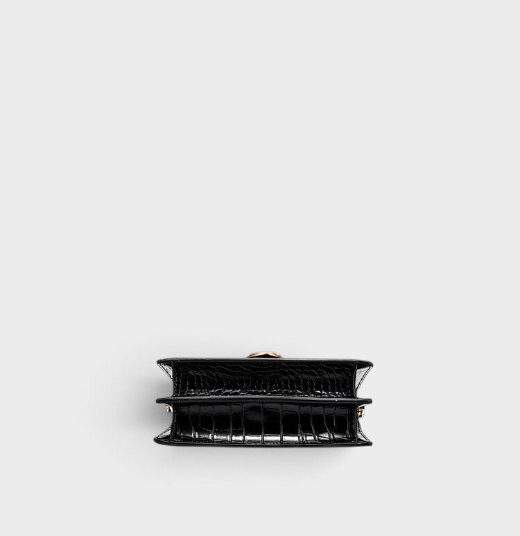 VALENORA Nancy shoulder bag in black croc-embossed cowhide leather, viewed from the top showing the structured base.