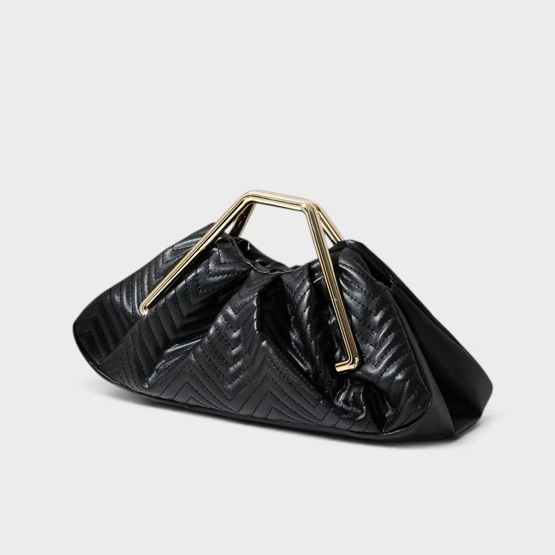 VALENORA Norah handbag in black vegan leather with a quilted herringbone pattern and gold-tone magnetic frame closure.