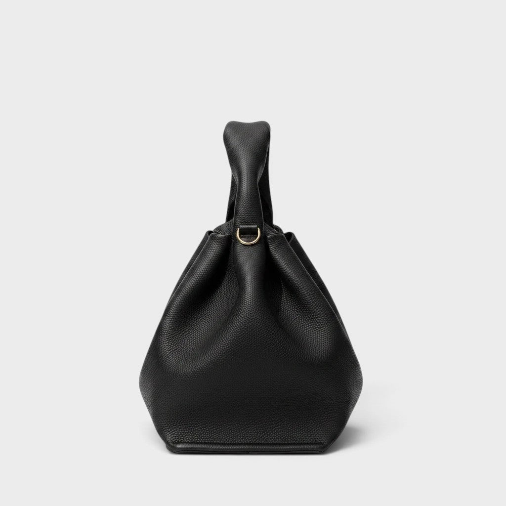 VALENORA Nova black vegan leather tote bag with a structured silhouette and gold hardware detail
