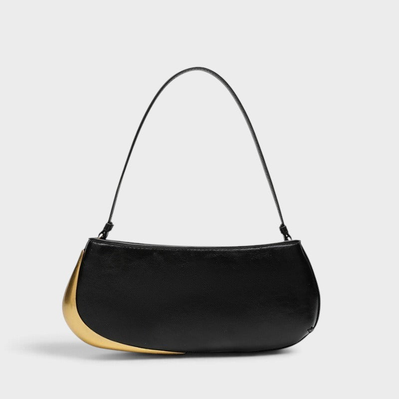 VALENORA Rosanna shoulder bag in black with a sleek curved silhouette and a striking metallic gold side accent.