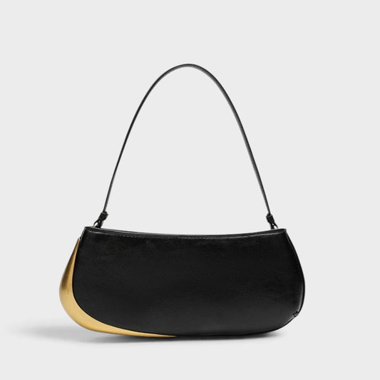 VALENORA Rosanna shoulder bag in black with a sleek curved silhouette and a striking metallic gold side accent.