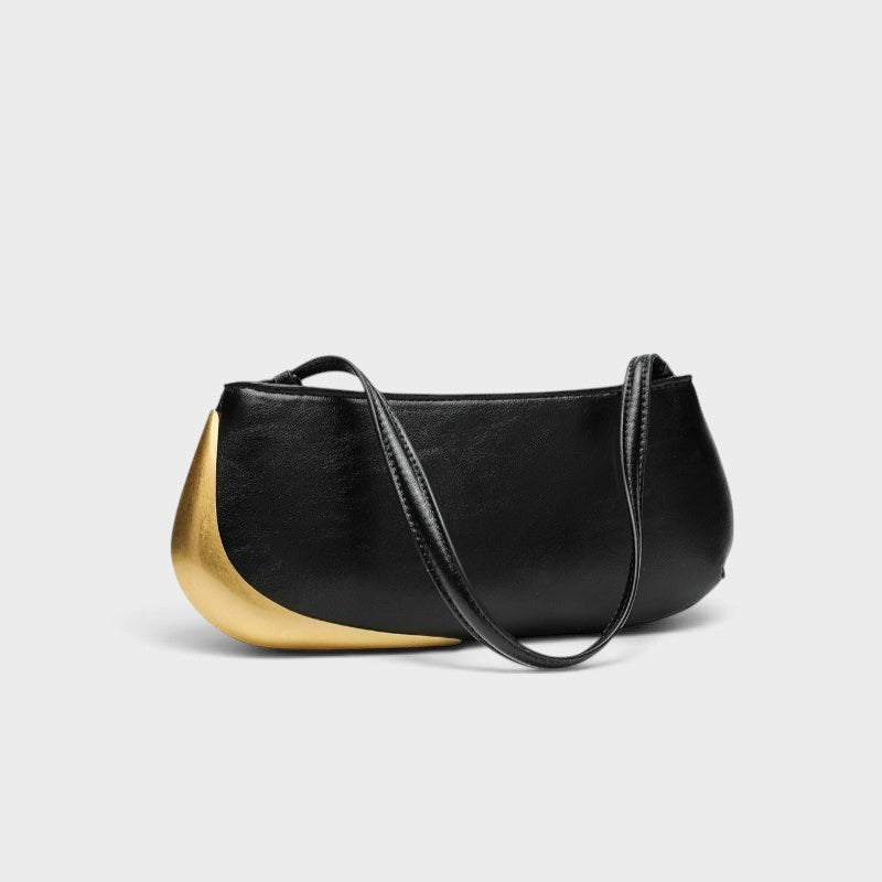 VALENORA Rosanna shoulder bag in black with a sleek curved silhouette and striking metallic gold side accent.