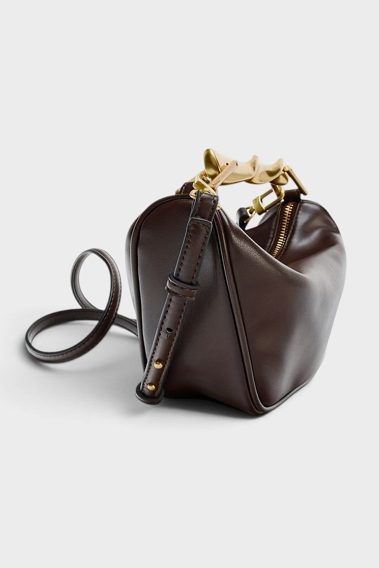 VALENORA Roxane handbag in dark brown vegan leather with a unique gold-tone metal handle and removable shoulder strap