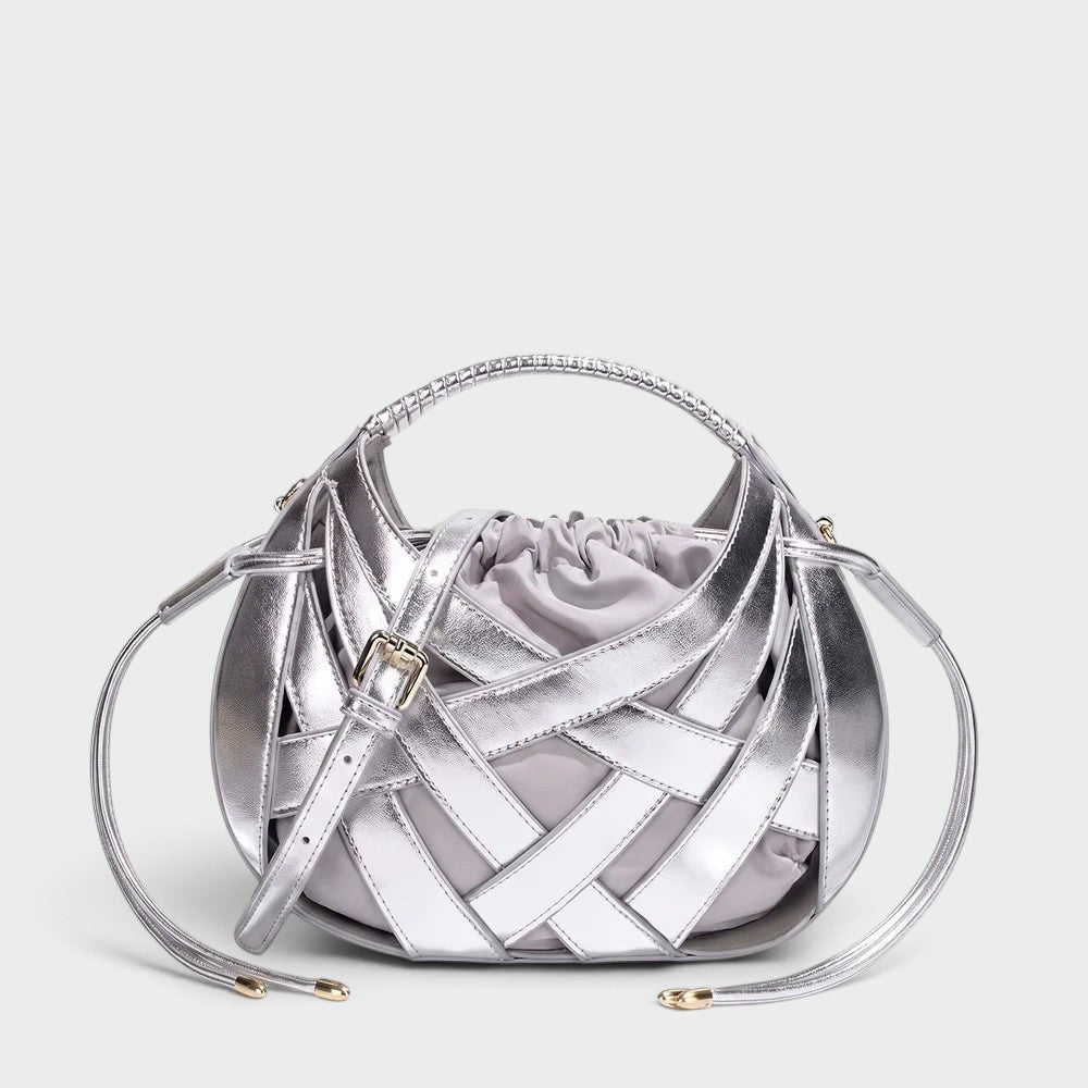 VALENORA Ruby handbag in metallic silver vegan leather with an architectural lattice overlay and drawstring pouch.