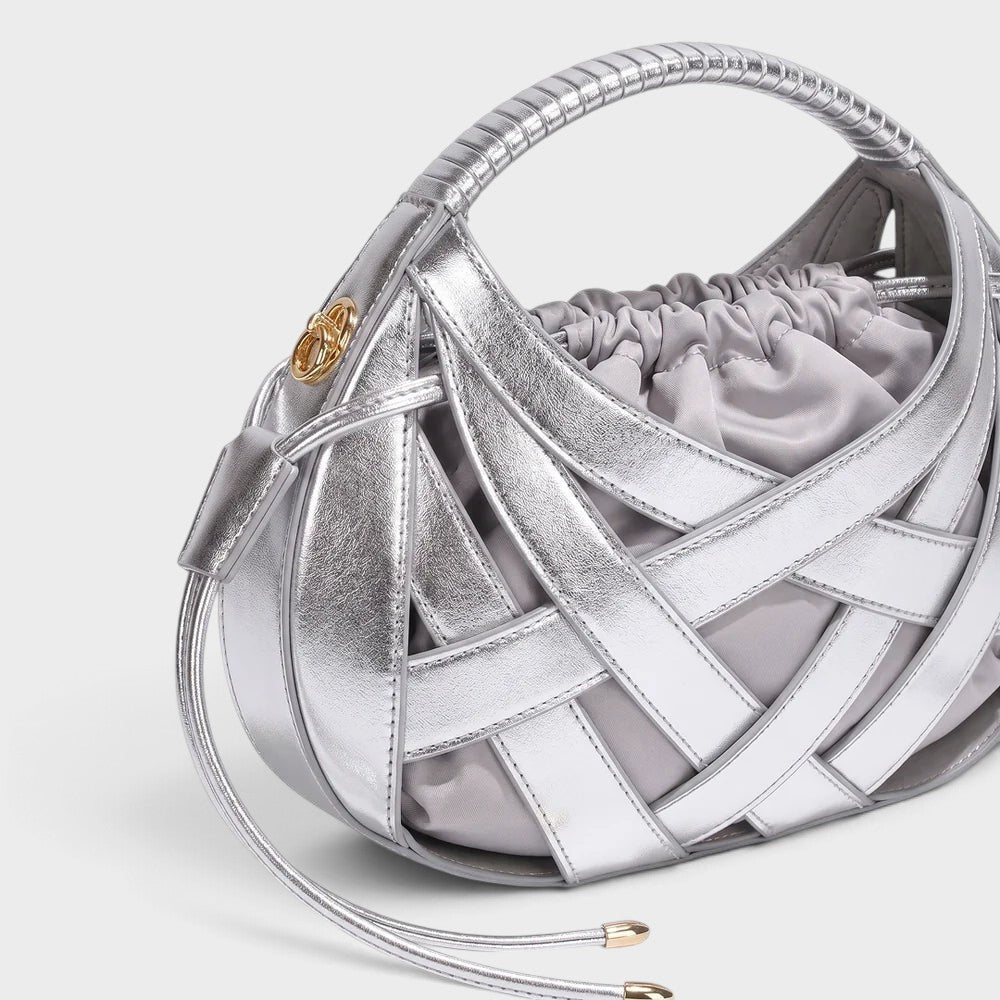 VALENORA Ruby silver vegan leather handbag with architectural lattice overlay and soft drawstring pouch interior