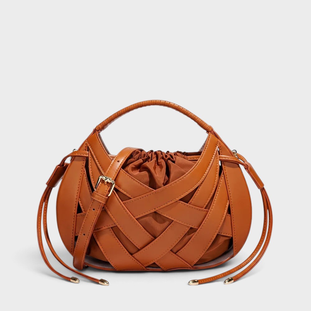 VALENORA Ruby handbag in tan vegan leather featuring a structured lattice overlay and a soft drawstring pouch interior.