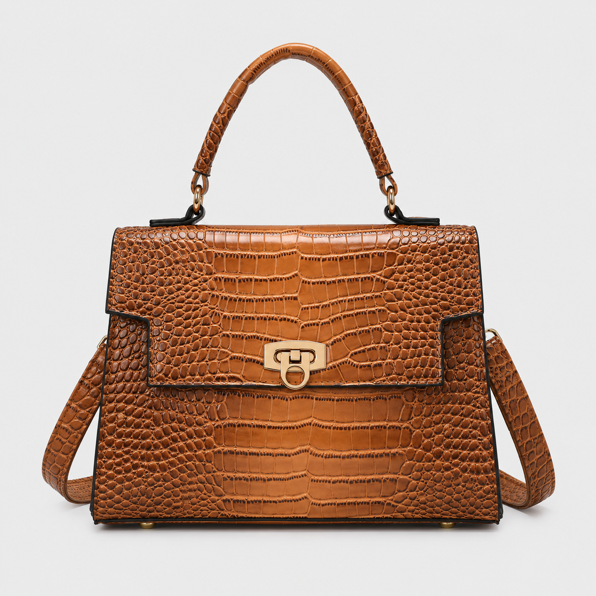 VALENORA Selene brown vegan leather handbag with crocodile-embossed texture and gold-tone twist lock closure.