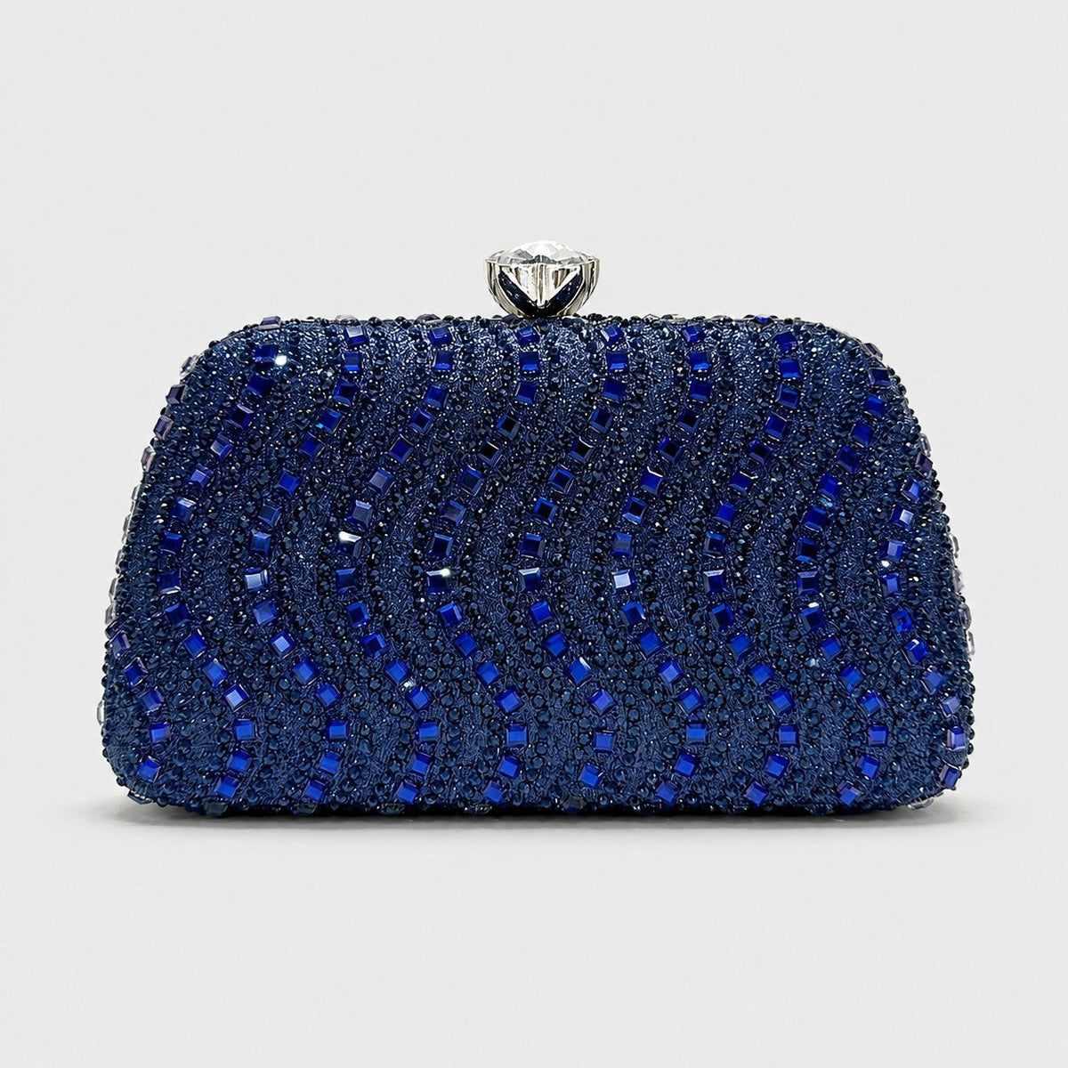 VALENORA Séraphine clutch bag in navy blue with a crystal wave pattern and a diamond-inspired snap closure.